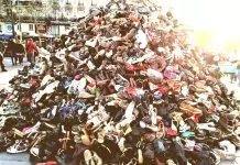 a huge pile of old shoes